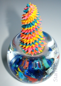 Leo Jean's Starlike© paper sculpture on glass fishbowl paperweight