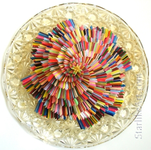 Leo Jean's large Starlike© paper sculpture mounted on round crystal platter