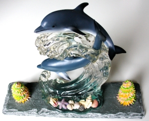 Leo Jean's Starlike© paper sculpture mounted on slate with porcelain and resin dolphin figurine